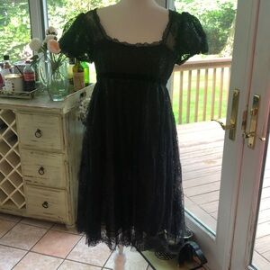 A beautiful Marchese, black lace with shimmer cocktail dress